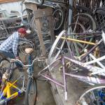 Bob Lakey of Port Townsend looks over free bike parts at the ReCyclery. (Jesse Major/Peninsula Daily News)