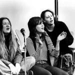 Holly Near, left, Jane Fonda and an unidentified woman sang and spoke at an Indochina Peace Campaign event.