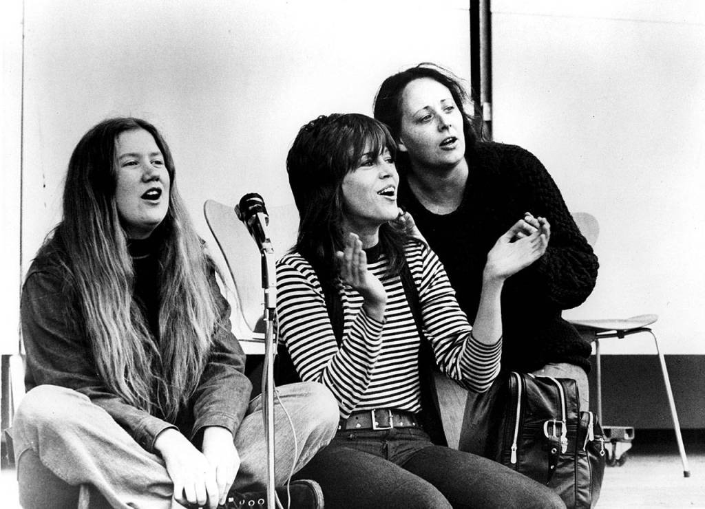 Holly Near, left, Jane Fonda and an unidentified woman sang and spoke at an Indochina Peace Campaign event.