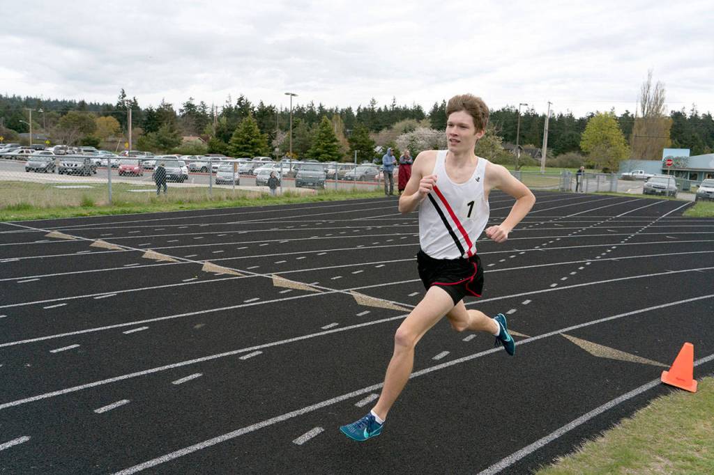 Steve Mullensky/for Peninsula Daily News Port Townsends Nathan Cantrell has a formidable lead in the first lap of the boys 1600 meter run during a meet at Blue Heron Middle School on Tuesday.