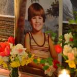 A boyhood photo of Jarrod Paul Bramson stands beside the guest books during a memorial gathering for him Saturday. The event drew hundreds of mourners to the Jefferson County Fairgrounds in Port Townsend. (Diane Urbani de la Paz/for Peninsula Daily News)