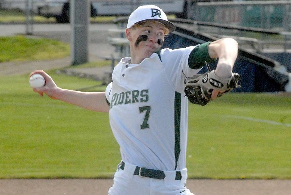 Port Angeles Hayden Woods pitches in the opening inning of Wednesdays game against Kingston at Port Angeles Civic Field. (Keith Thorpe/Peninsula Daily News)