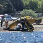 Neil Morrison and Eric Taylor were injured when this plane crashed on a Discovery Bay beach on Sunday. (East Jefferson Fire-Rescue Marine Unit)