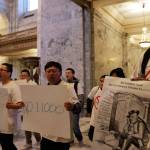 Opponents of an Initiative 1000 march and chant in the Capitol as the Senate debates the measure Sunday in Olympia. (Rachel La Corte/The Associated Press)