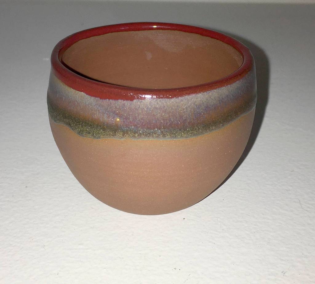 The ceramic cups made by LaughinGnome sell for a $10 donation to Olympic Neighbors.