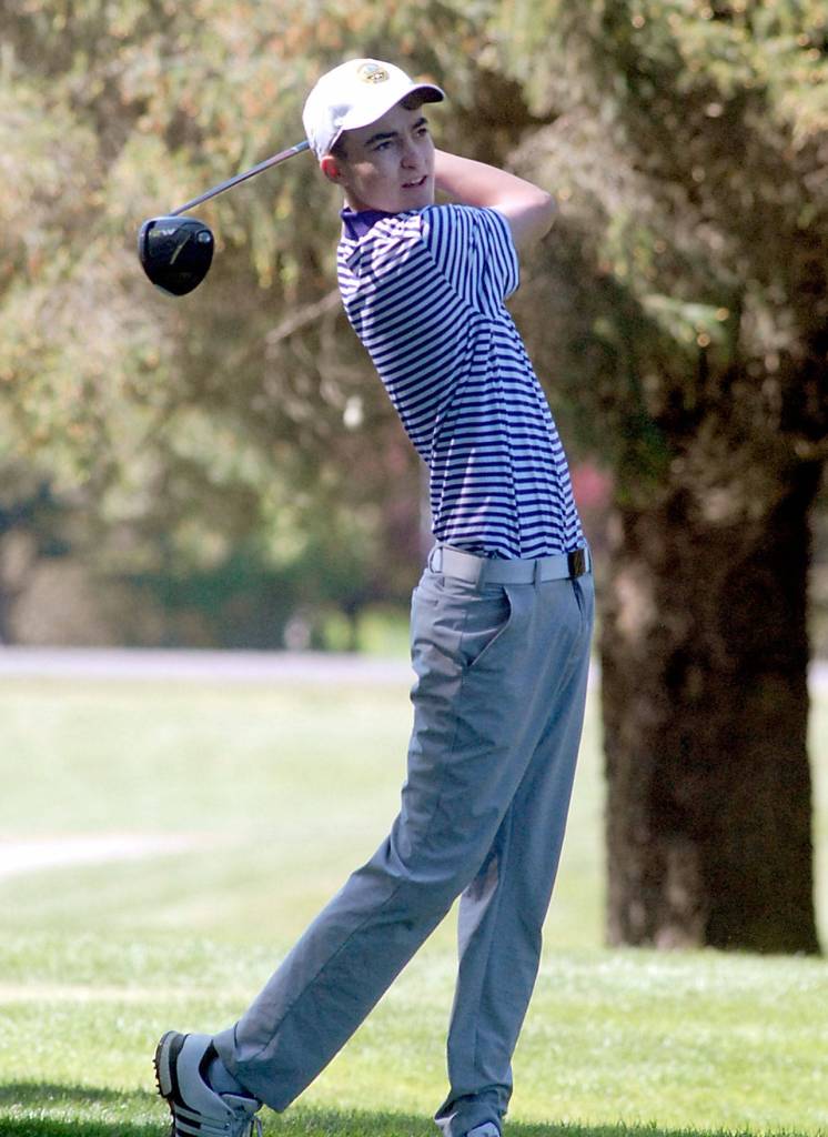 Keith Thorpe/Peninsula Daily News Paul Jacobsen of Sequim tees off during Tuesdays Olympic League Championship tournament at The Cedars at Dungeness near Sequim.