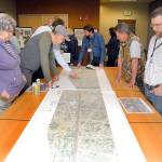 Port Angeles road planners meet with members of the public during an open house on Wednesday on proposals to repave and improve a section of Lauridsen Boulevard from Lincoln to Race streets in Port Angeles. (Keith Thorpe/Peninsula Daily News)