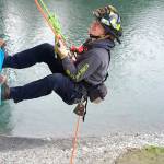Firefighter/EMT Tyler Gear rappels off the Elwha River Bridge during technical rescue training.