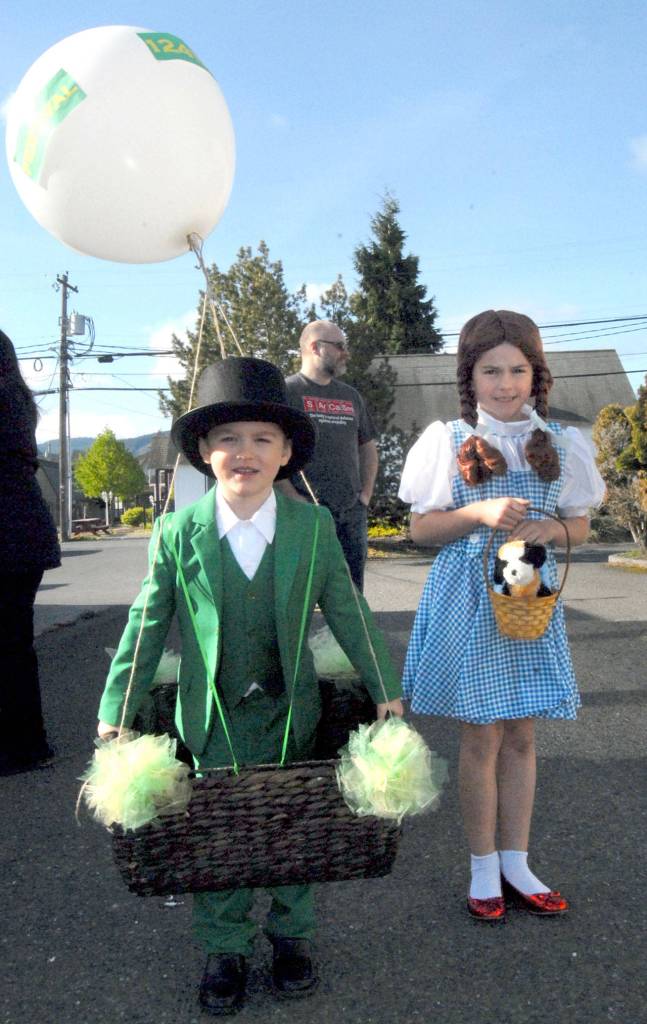 Greyson Rhodes, 5, and Emma Rhodes, 9, of Sequim, dress as the Wizard and Dorothy from The Wizard of Oz. The pair were the overall winners of the Kiddie Parade. (Keith Thorpe/Peninsula Daily News)