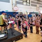 Caspar Babypants performs for children at Salish Coast Elementary School in Port Townsend at a concert to benefit Jefferson Universal Movement Playground. (Sarah Grossman)