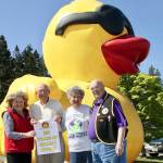 Four people have sold ducks for the Duck Derby for all 30 years of its existence. From left, are Gail Ralston, Dick Kent, Edie Beck and Scooter Chapman at Swains General Store recently. (Dave Logan/for Peninsula Daily News)