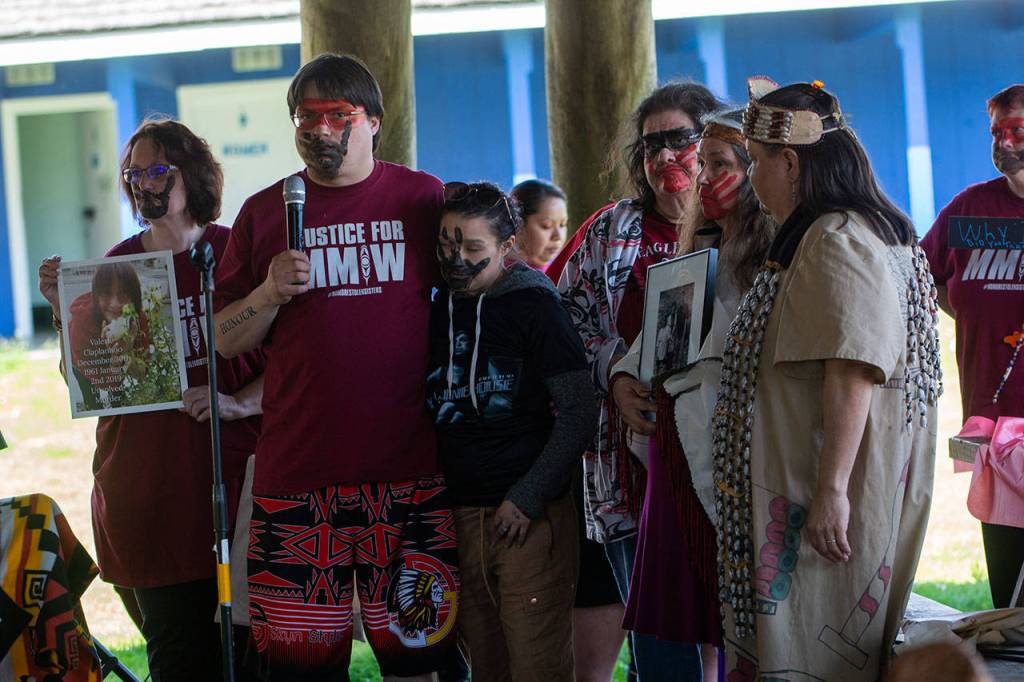 The family of Valerie Claplanhoo, a Makah woman who was killed in Sequim on Jan. 2, speaks during the Missing and Murdered Indigenous Women march in Forks on Sunday. (Jesse Major/Peninsula Daily News)