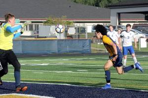 PREP SOCCER PLAYOFFS: Forks pulls out a stoppage time heart-stopper