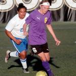 Keith Thorpe/Peninsula Daily News Chris Morgan of Sequim, right, slips past the defense of Washingtons Ariano Taitague Chavez on Tuesday at Peninsula College in Port Angeles.