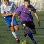 Keith Thorpe/Peninsula Daily News Sequims Ryan Tolberd, right, tries to stay ahead of Franklins Edgar Ramos on Tuesday at Peninsula College in Port Angeles.
