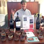 Randy Rosens offers ceramic cups made by LaughinGnome during Gallery Walks.