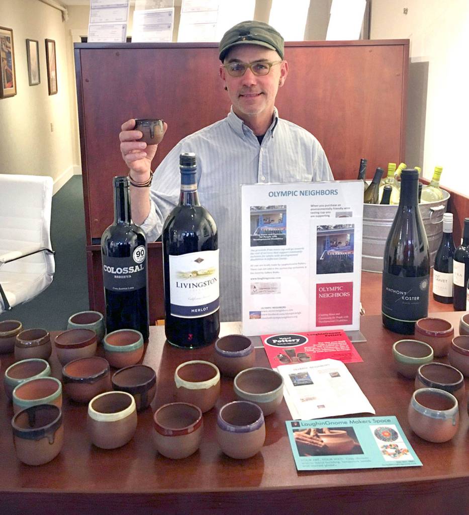 Randy Rosens offers ceramic cups made by LaughinGnome during Gallery Walks.