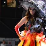 Pearl Munn of Quilcene models Coal and Fire, a piece originated by student artist Olivia Benson, in Saturdays Port Townsend Wearable Art Show. (Diane Urbani de la Paz/for Peninsula Daily News)