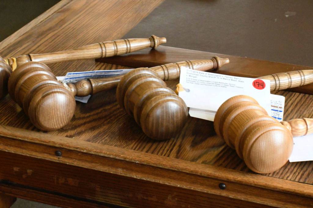 Gavels used during state Supreme Court hearings are recorded with cases and dates. They are available for sale as a fundraiser to pay for art in the Temple of Justice, which was built in 1913. The gavels used in Port Townsend on Tuesday and others used throughout the year are available for sale through the Washington Courts Historical Society website at https://wacourthistory.org. (Jeannie McMacken/ Peninsula Daily News)