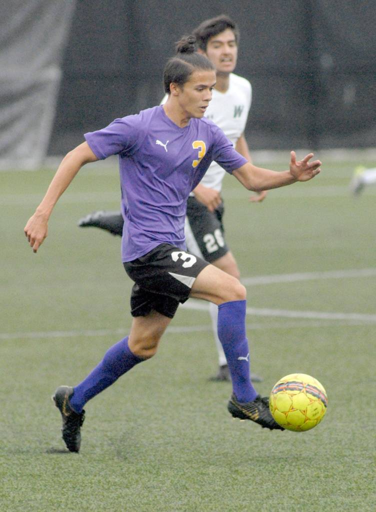Sequims Ryan Tolberd dives downfield on Wednesday. (Keith Thorpe/Peninsula Daily News)