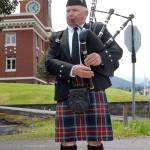 Dr. Tom McCurdy plays bagpipes at the begging of Fridays ceremony honoring fallen law enforcement officers. (Keith Thorpe/Peninsula Daily News)