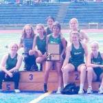 The Port Angeles girls track team celebrates winning the WCD III 2A district meet in Bremerton. Sequim also won the boys meet, as both schools will send a combined two dozen athletes to the state 2A meet at Mount Tahoma High School on Thursday.