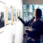 Jeanette Painter of Port Angeles admires a recent exhibit at the Port Angeles Fine Arts Center. The nonprofit center is changing the offerings in its indoor gallery and outdoor sculpture park. (Port Angeles Fine Arts Center)