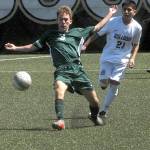 <strong>Keith Thorpe</strong>/Peninsula Daily News                                Port Angeles Andrew St. George passes the ball during a district playoff game earlier this month.