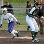 Sequims Isabelle Dennis, left, prepares to leave first base during a recent game against Port Angeles.                                Keith Thorpe/Peninsula Daily News