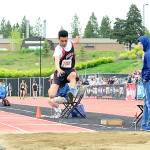 Neah Bays Sean Bitegeko competes in the long jump in Cheney at the 1B state track and field meet. Bitegeko finished 12th with a jump of 37 feet, 5 3/4 inches. (Casey Bruner)