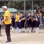 Forks Chole Leverington (9) heads for home after knocking the ball over the left field fence as the Spartans defeated Lynden Christian 5 to 0. Awaiting at home plate are a group of happy Spartans while head Coach Jr. Dean looks on. Lonnie.