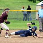 Lonnie Archibald/for Peninsula Daily News Forks Rian Peters steals second base ahead of the tag by Cle Elum-Roslyns Katelyn Ness.