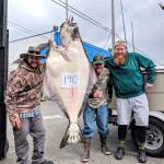 Halibut anglers from left, Nick Roberts, Bob Harrison and Craig Rice teamed to bring aboard this 190-pound halibut Friday off Port Angeles. Its the second halibut catch of more than 155 pounds that Harrison has been involved in since 2017.