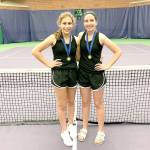 Sequims Jessica Dietzman, left, and Kalli Wiker are the state 2A girls doubles tennis champions after beating Nina Vongslay and Katrina Kuntz of Sammamish 6-7, 6-2, 6-1 Saturday in the championship match at the Nordstrom Tennis Center in Seattle.