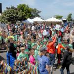 Keith Thorpe/Peninsula Daily News Children and their parents gather around the park at City Pier at the start of Saturdays Kids Marathon.