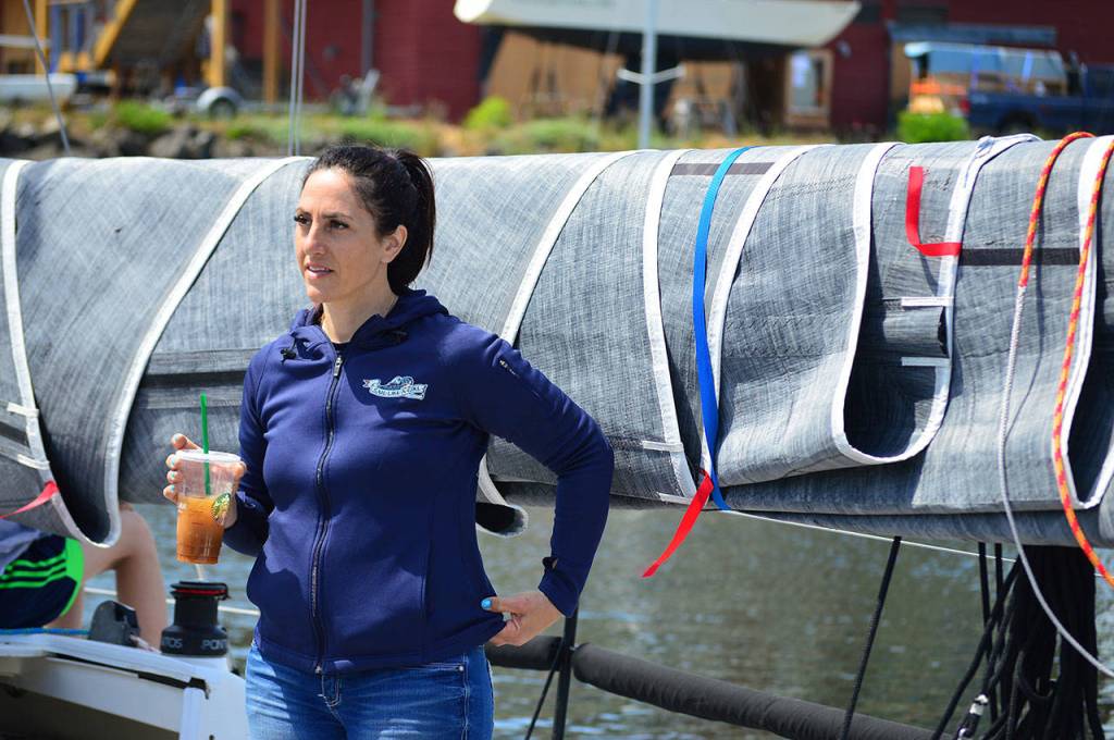 Jeanne Goussev, skipper of Team Sail Like a Girl, sharpened her focus Sunday afternoon at Point Hudson. She and her crew, winners of the 2018 Race to Alaska, have returned to Port Townsend for another 750-mile voyage. (Diane Urbani de la Paz/for Peninsula Daily News)