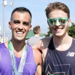 Dave Logan/for Peninsula Daily News Mikey Cobb of Sequim, right, celebrates his marathon victory with second-place finisher Derek Lactaoen of Seattle. Cobb won in record time, nearly four minutes ahead of Lactaoen, who beat the third-place finisher by 16 full minutes.