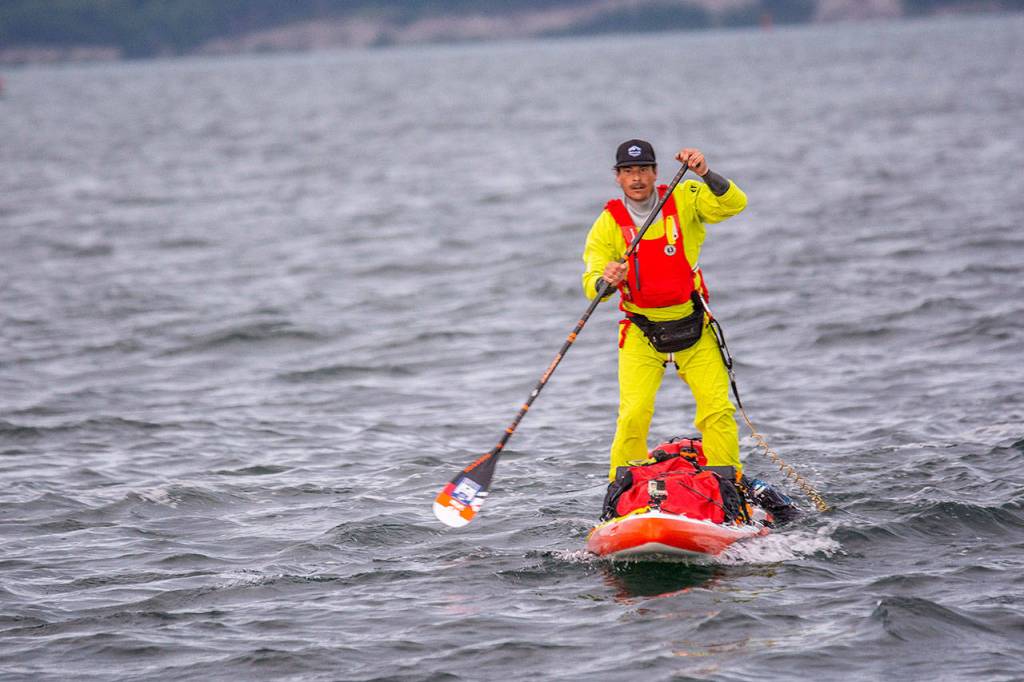 Alex de Sain of Amsterdam of The Netherlands begins his journey to Alaska during the first leg of the Race to Alaska on Monday morning. (Jesse Major/Peninsula Daily News)