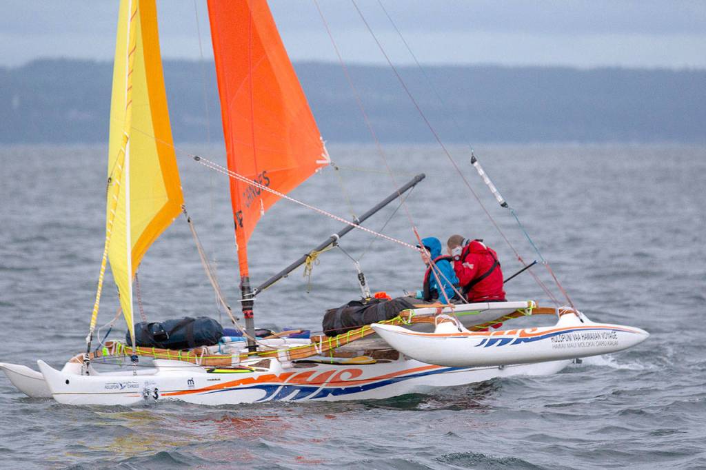 Team Holopuni makes its way to Victoria Monday morning during the first leg of the Race to Alaska. (Jesse Major/Peninsula Daily News)