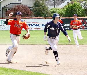 Dave Logan/for Peninsula Daily News Wilders Milo Whitman gets caught in a rundown against Bellingham Post No. 7 on Sunday at Civic Field. Whitman had a walkoff hit in the bottom of the seventh inning to help Wilder beat Bellingham 3-2. Wilder also won the second half of a doubleheader 12-2.