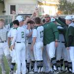Submitted photo Port Angeles head coach Karl Myers, center, is leaving the program after five seasons, including three as head coach. The Roughriders posted a 52-18 record with three state appearances, back-to-back Olympic League titles and a West Central District championship under Myers.