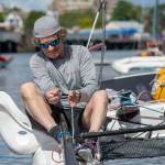 Tom Kassberg of Team Pear Shaped Racing prepares for the Race to Alaska on Thursday. (Jesse Major/Peninsula Daily News)