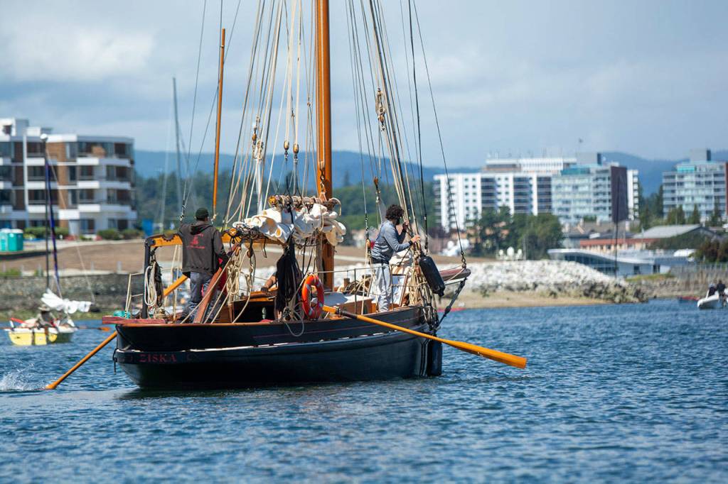 The crew of the Ziska start the Race to Alaska in Victorias Inner Harbour on Thursday. (Jesse Major/Peninsula Daily NEws)