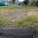 A curb without a wheelchair access cut stands at the corner of Francis and Georgiana streets in Port Angeles. (Keith Thorpe/Peninsula Daily News)