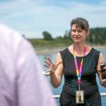 Genevra Harker-Klimes, division director of the Pacific Northwest National Laboratorys Marine Sciences Laboratory, leads a tour through the Sequim facility. (Jesse Major/Peninsula Daily News)