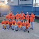 Laurel Lanes poses after winning the Cal Ripken championship