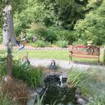 This Petals and Pathways garden offers a place to rest while enjoying the scenery.