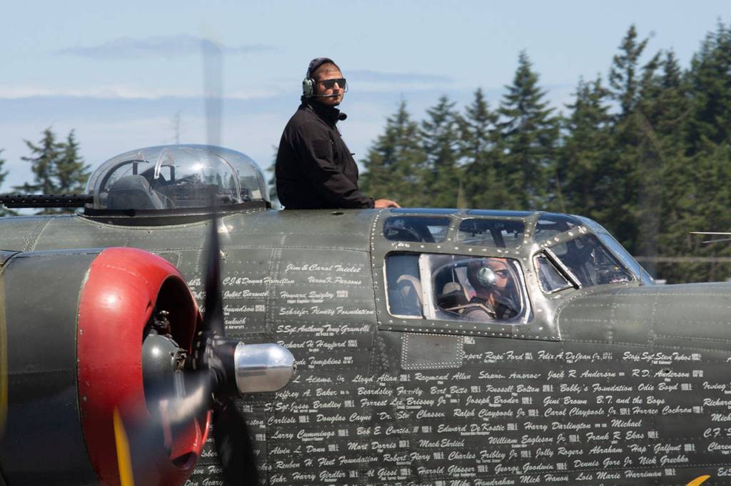 A B-24 Liberator taxis at William R. Fairchild International Airport on Wednesday. (Jesse Major/Peninsula Daily News)