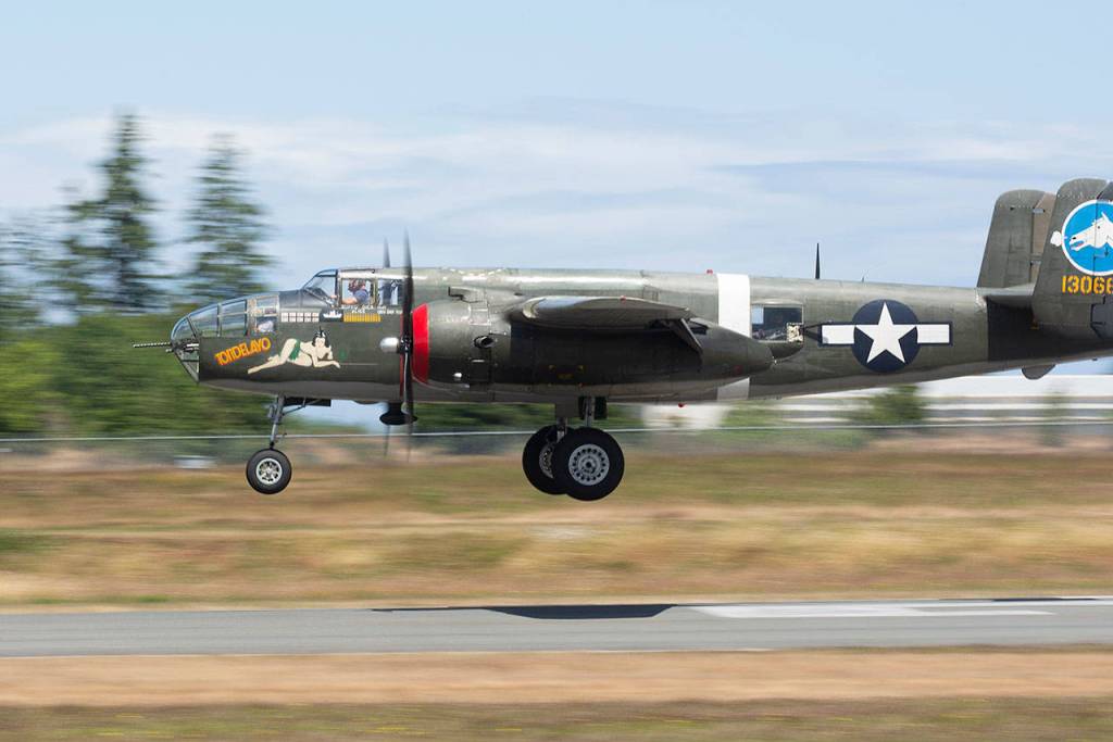 A B-25 Mitchell lands at William R. Fairchild International Airport Wednesday during the Wings of Freedom Tour. (Jesse Major/Peninsula Daily News)