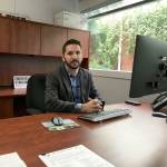 Port Angeles Public Works and Utilities Director Thomas Hunter in his new office at Port Angeles CIty Hall. (Rob Ollikainen/Peninsula Daily News)